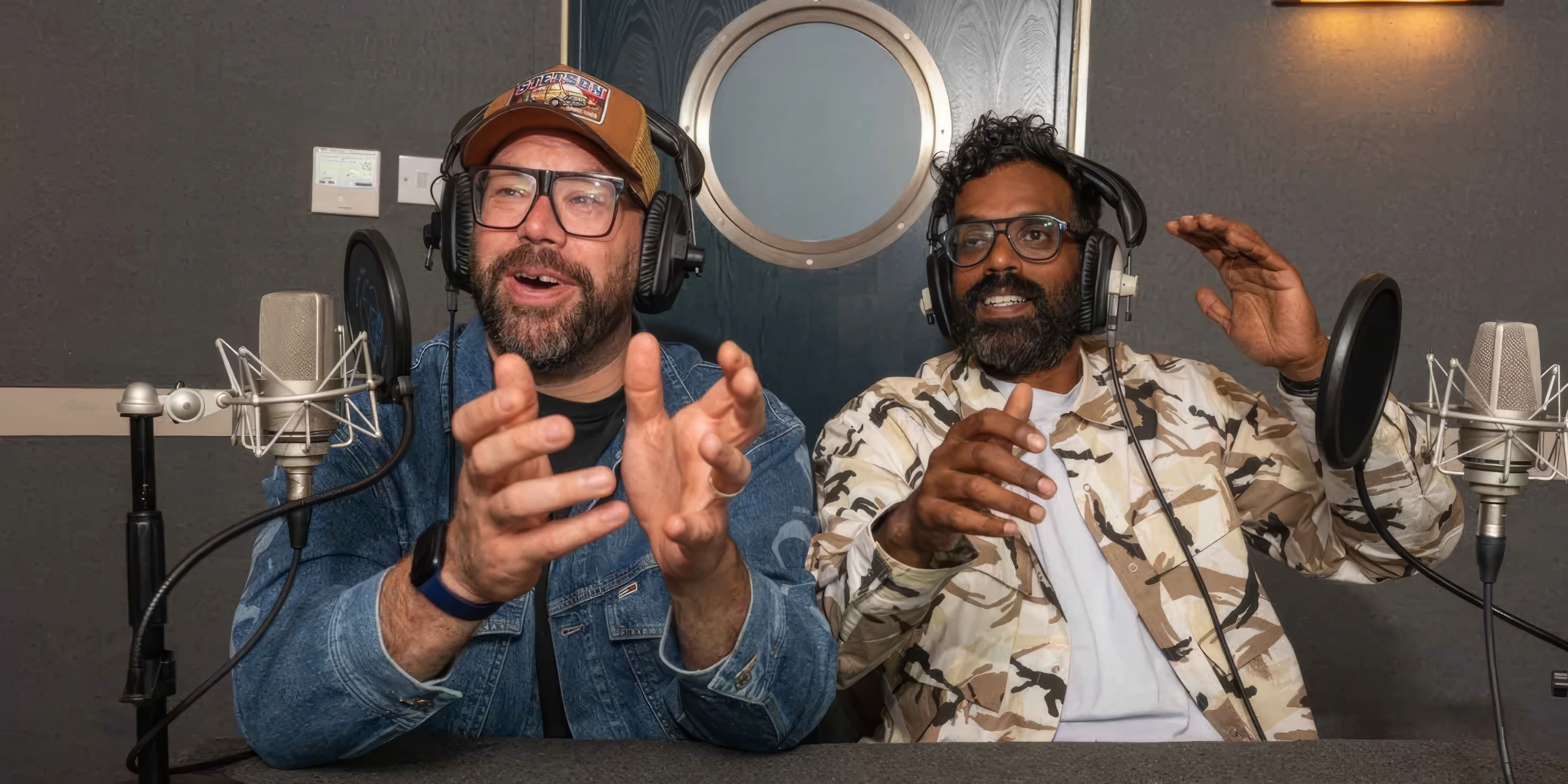 Tom Davis and Romesh Ranganathan in the recording studio